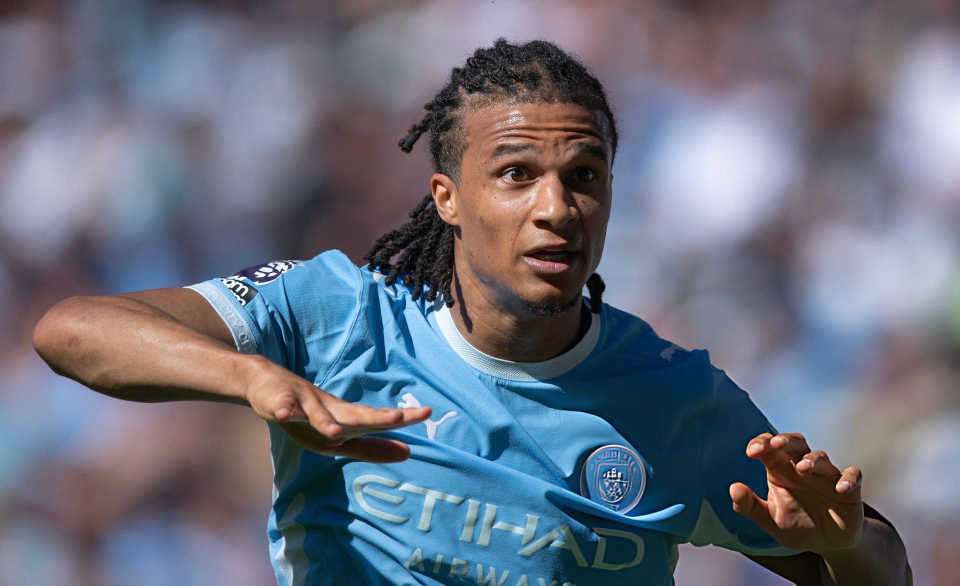 Nathan Aké celebrates for Manchester City in a Premier League match