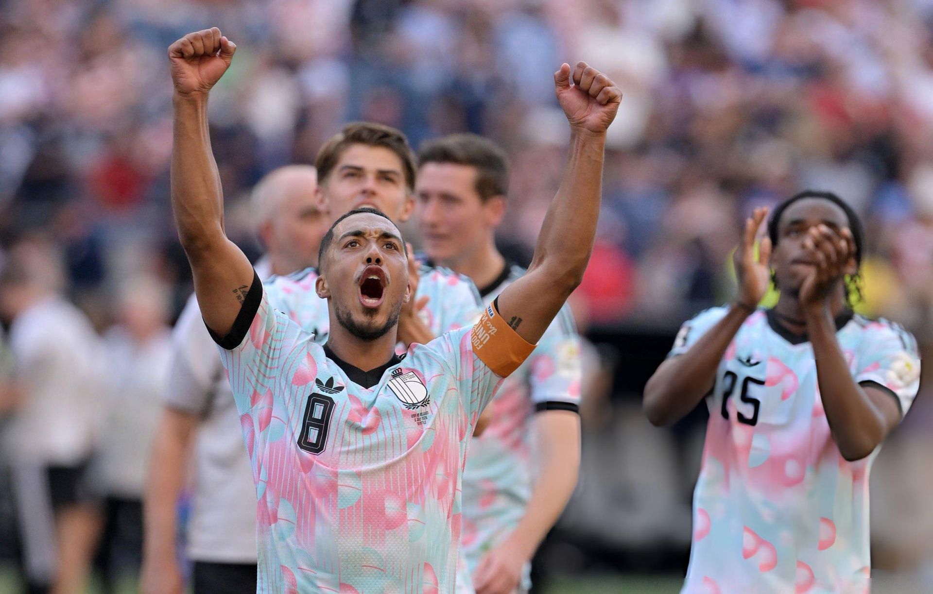 Belgium players celebrate against USA