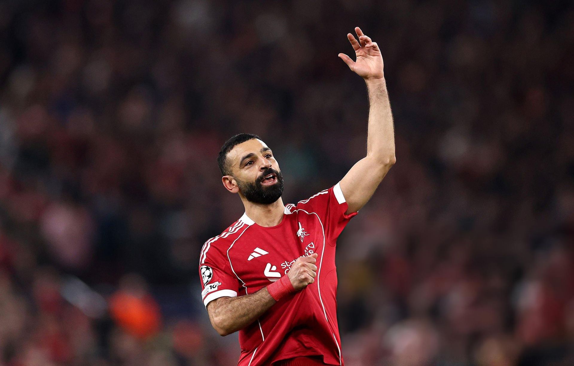 Mohamed Salah waves to the Liverpool crowd during his final appearance at Anfield