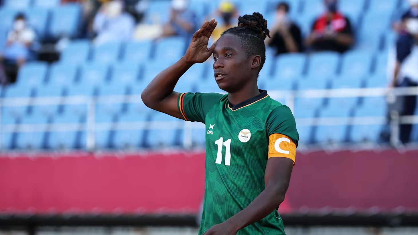 Zambia captain Barbra Banda salutes during an international match