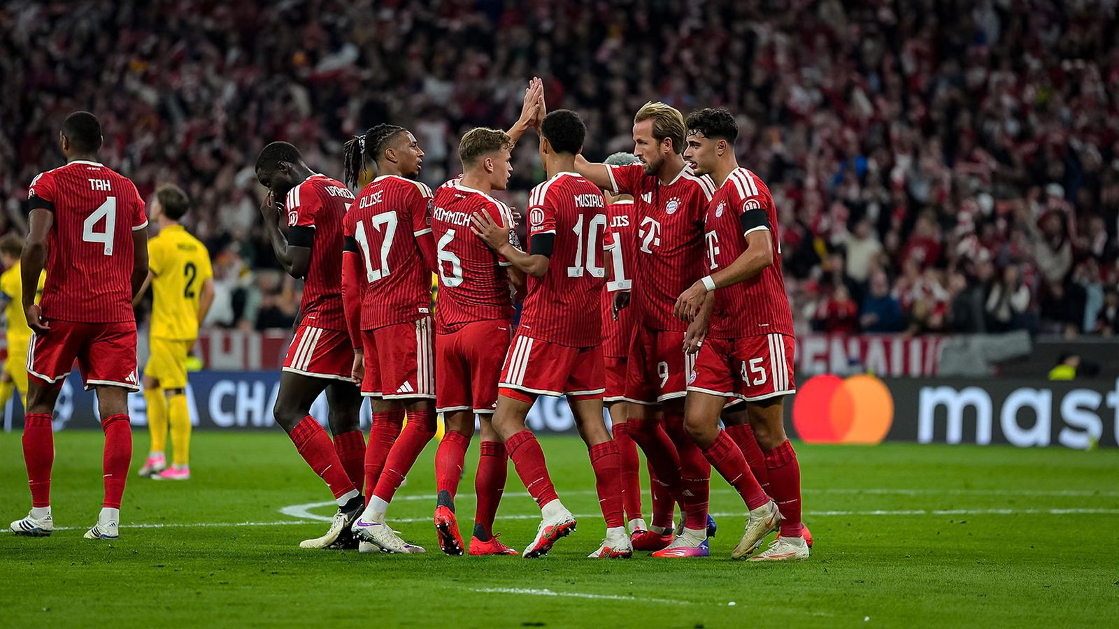 Michael Olise celebrates scoring for Bayern Munich against Bodo/Glimt
