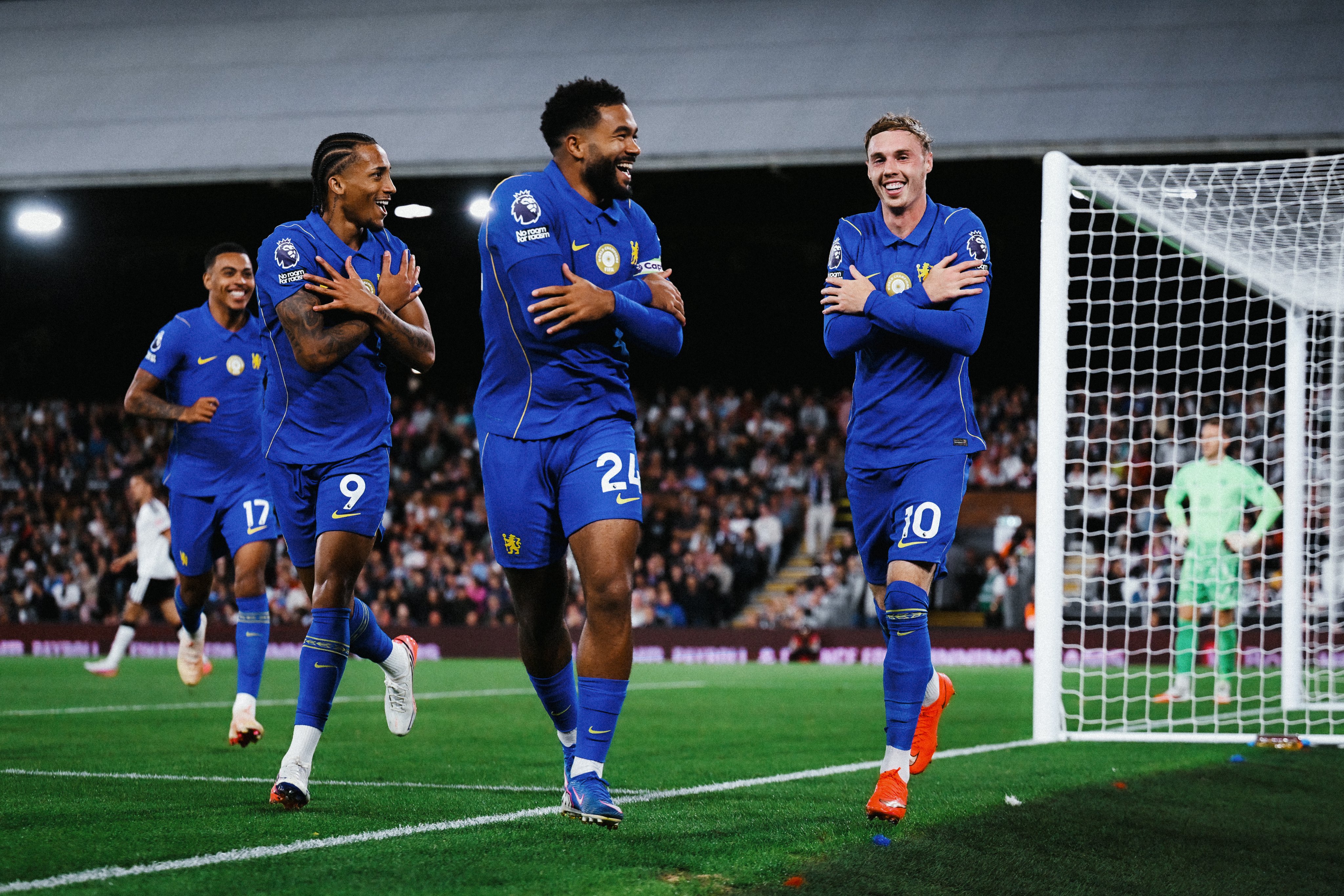 Cole Palmer celebrates after scoring for Chelsea against Fulham