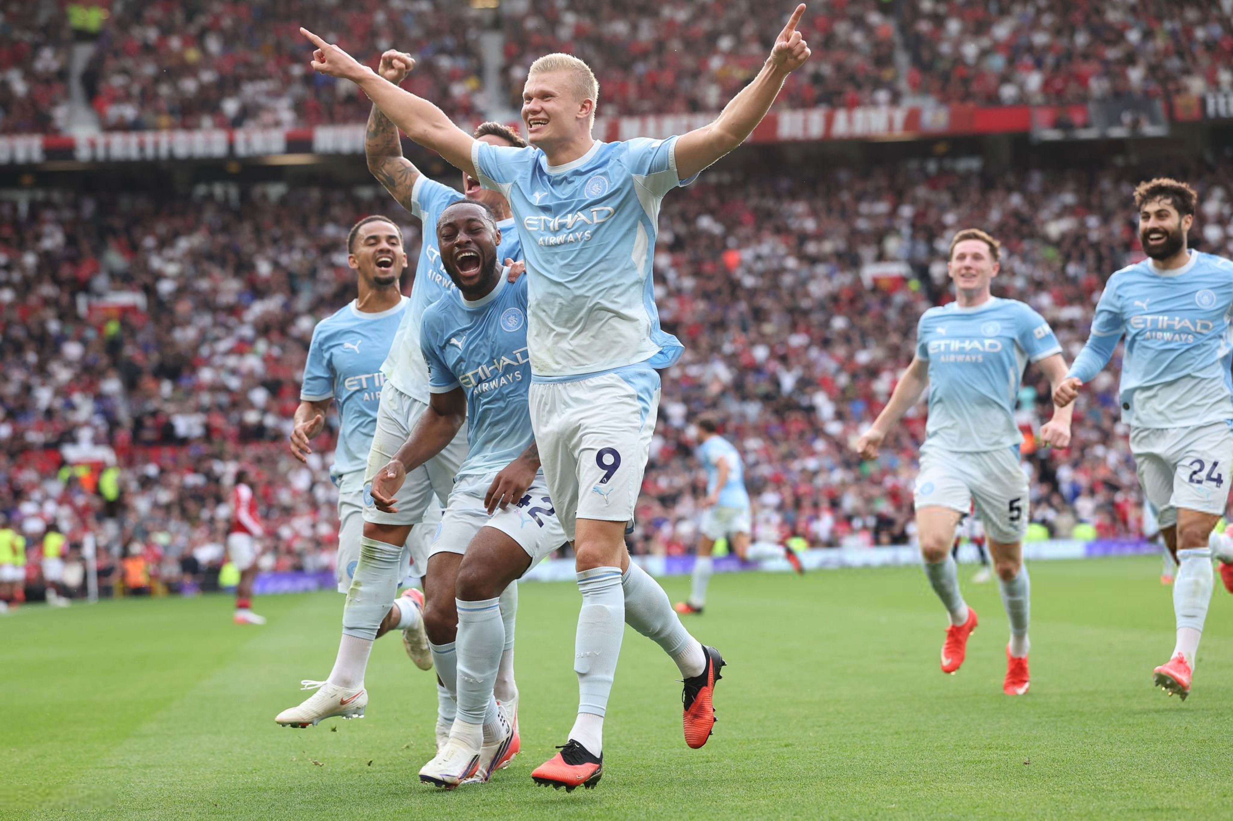Erling Haaland celebrates scoring for Manchester City against Manchester United