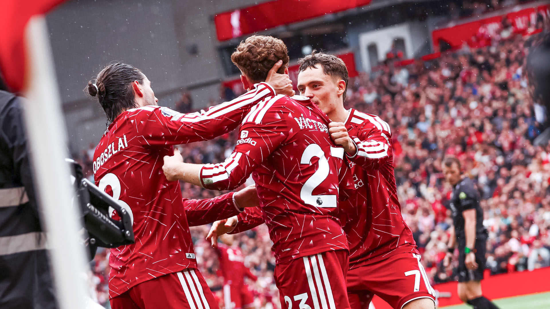 Alexander Isak and Daniel Muñoz celebrate for Liverpool against Nottingham Forest