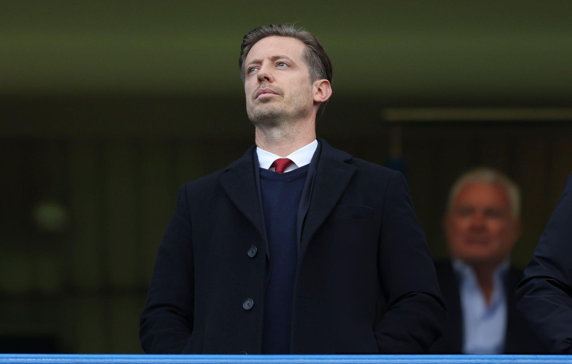 Michael Edwards watches from the stands