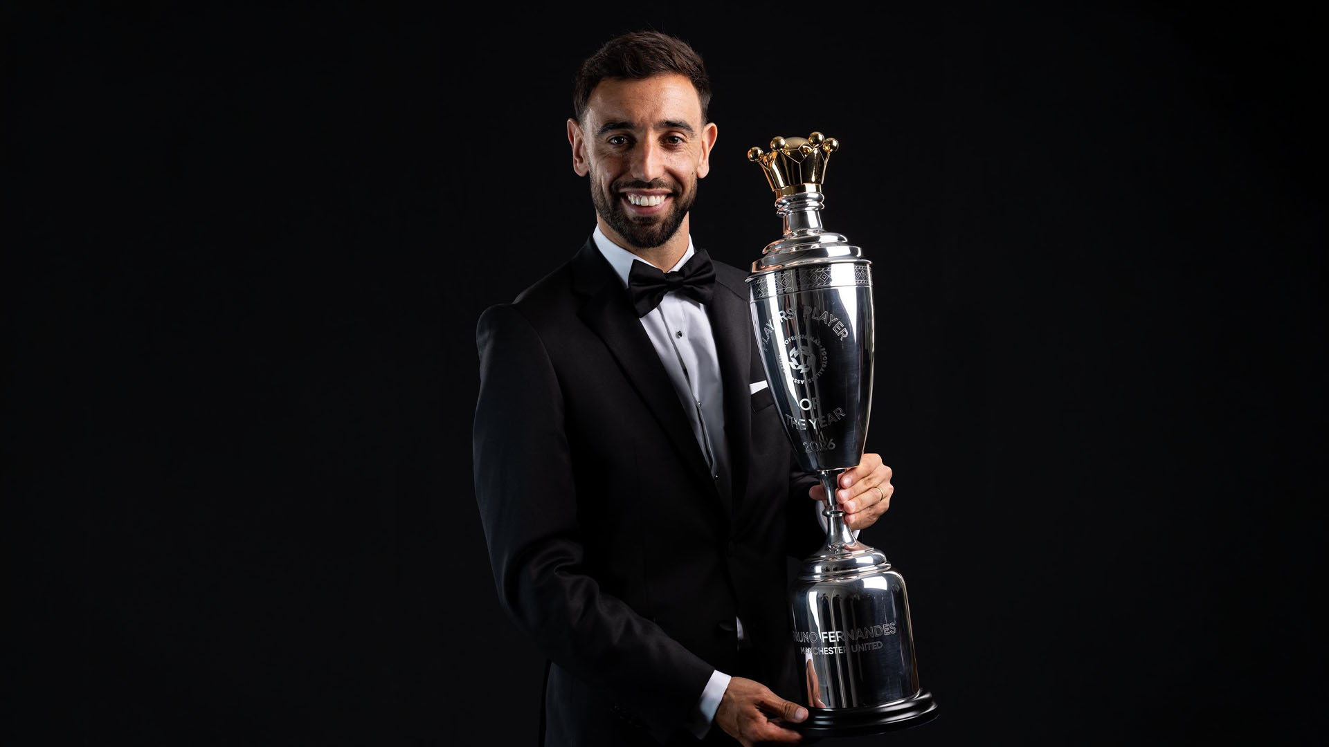 Bruno Fernandes and Khadija Shaw with their PFA Player of the Year awards