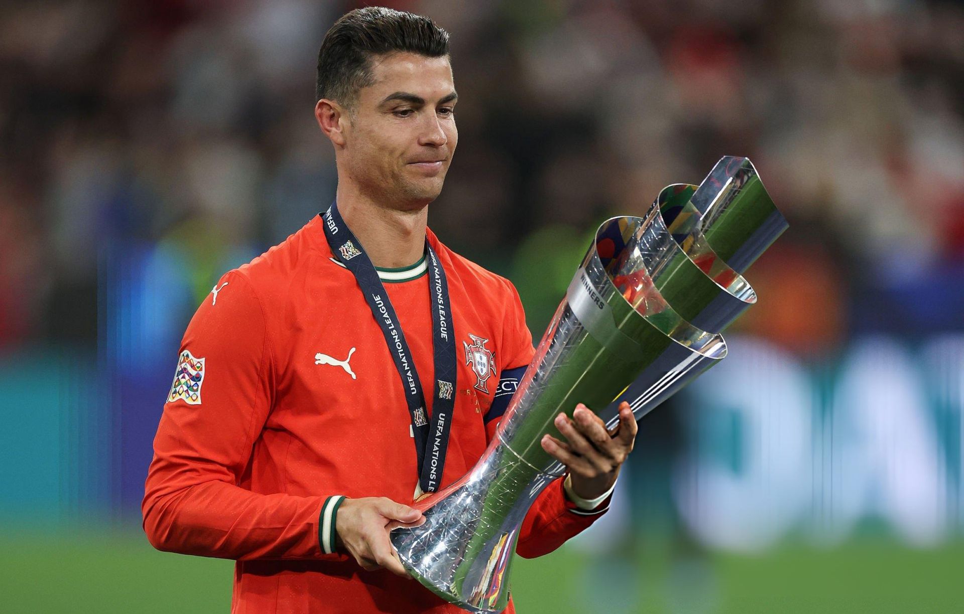 Cristiano Ronaldo holds the UEFA Nations League trophy after Portugal's 2024-25 title win