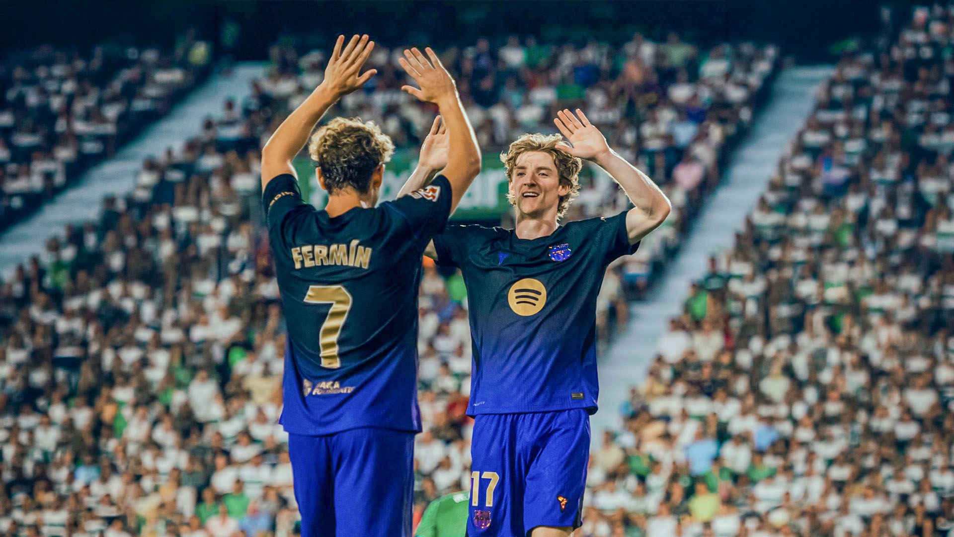 Raphinha celebrates after scoring for Barcelona against Elche