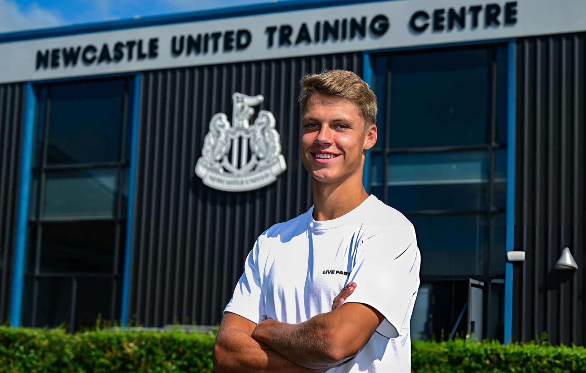 Sean Steur poses outside Newcastle United's training centre after completing his move from Ajax