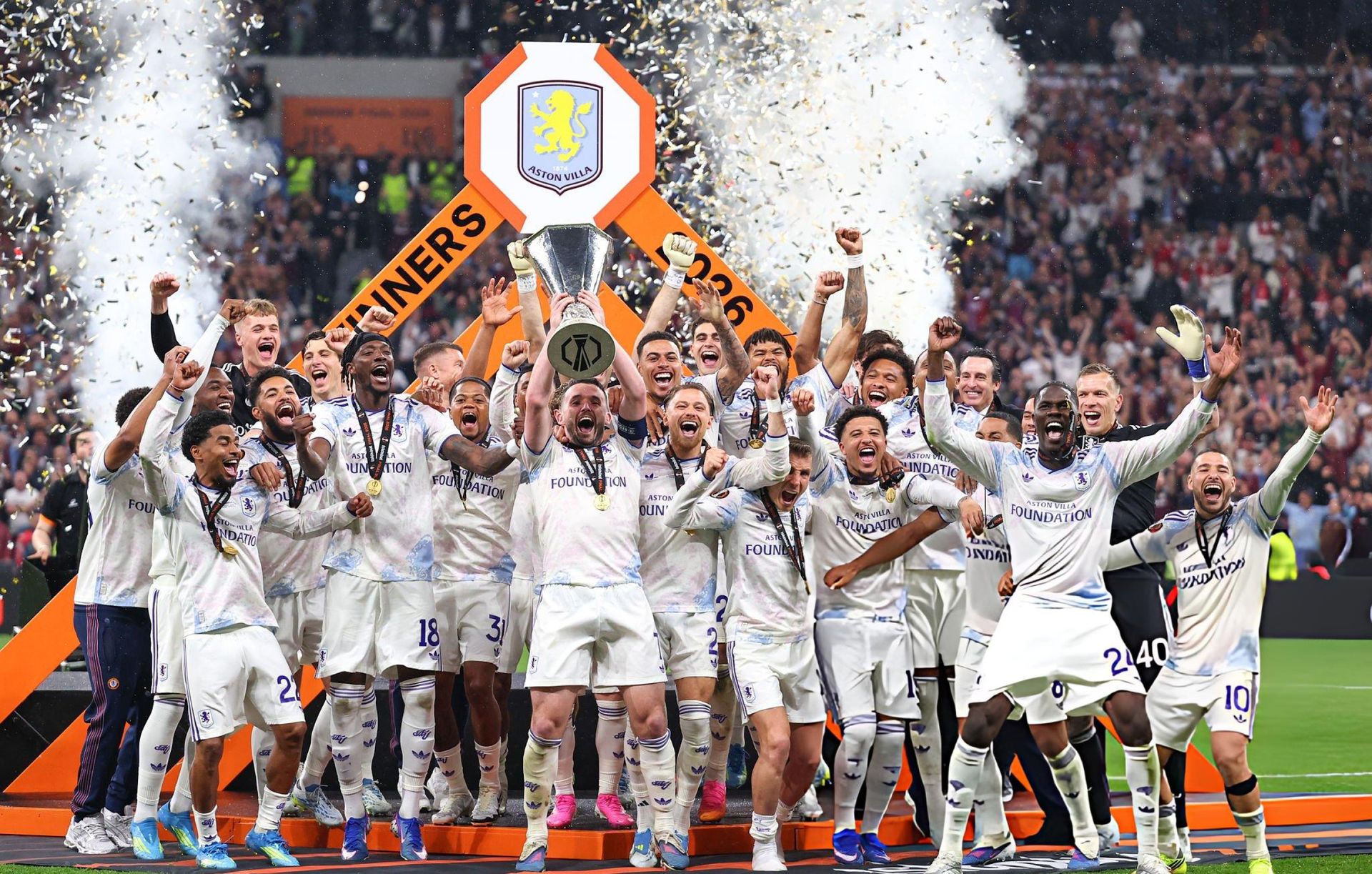 Aston Villa players celebrate with the Europa League trophy in Istanbul